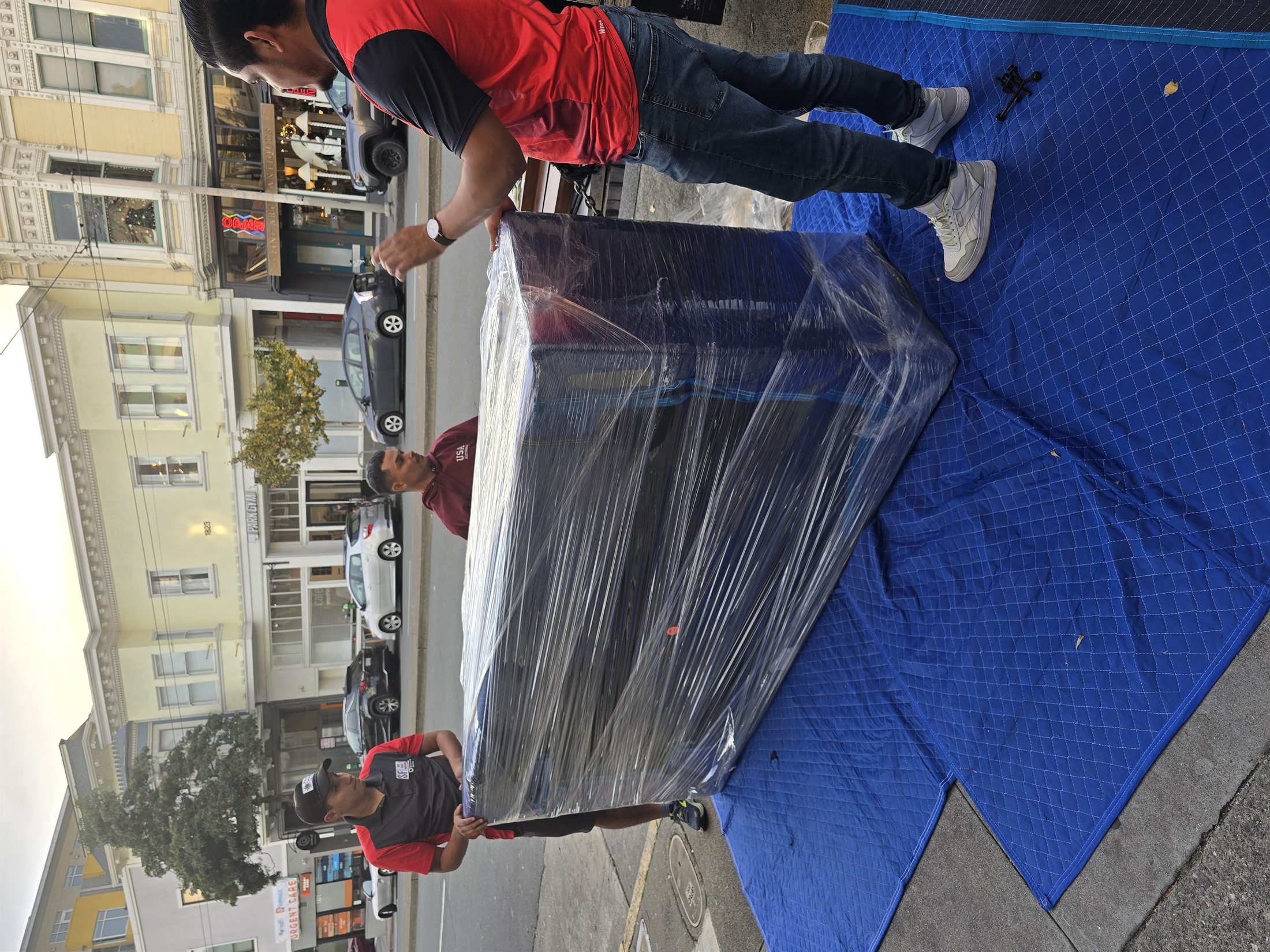 SF Bay Area Moving truck outside a commercial property