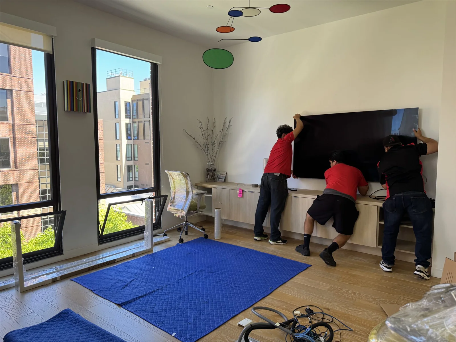 SF Bay Area Moving crew installing protected commercial equipment